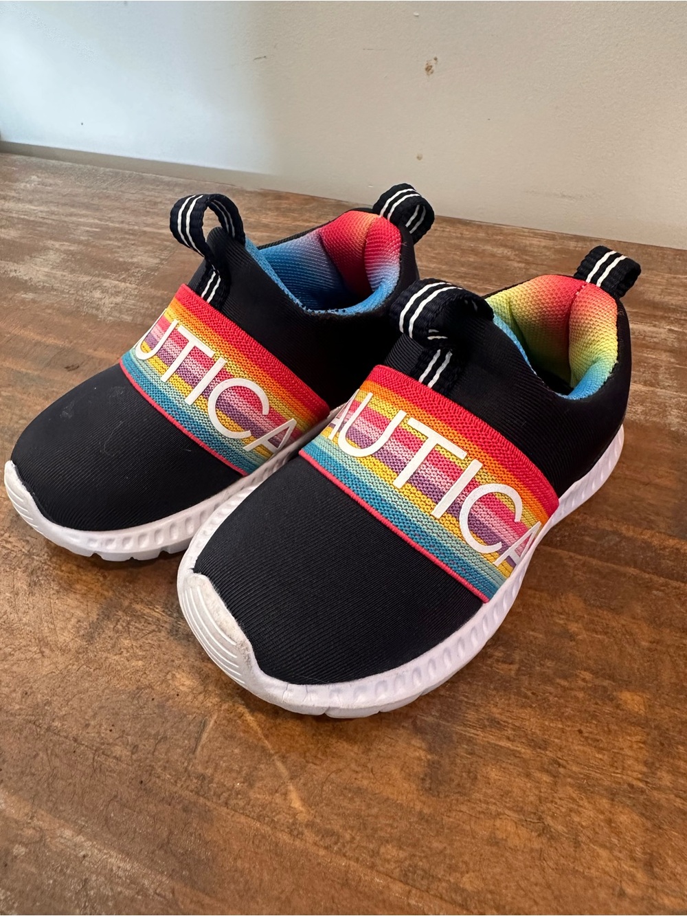 Nautica Kids Black Slip-On Sneakers with Rainbow Stripe